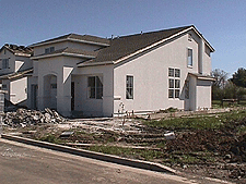 Side view with stucco.
