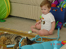 Hunter and Allie play with the jump rope.
