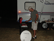 Dave BBQing some turkey burgers.
