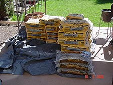 Dave has to mix 30 bags of cement!