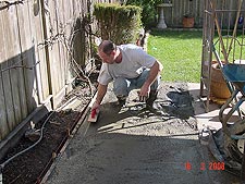 Dave leveling the cement.
