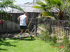 Hunter digging out the grass