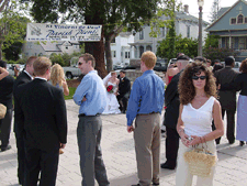 Heidi outside as Ro and Alysia pose for pictures.