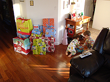 Hunter helps Ryder open a present.