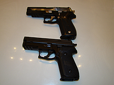 Pictured with the Sig P229