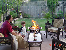 Dave and Hunter enjoy the fire.