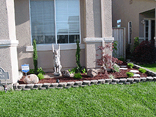 With added landscape rocks and plants.