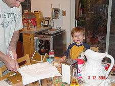 Dave helps assemble the walls.