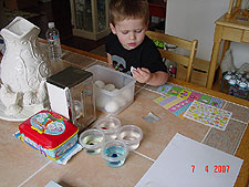 Coloring Easter eggs.