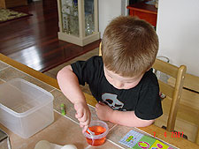 Coloring Easter eggs.