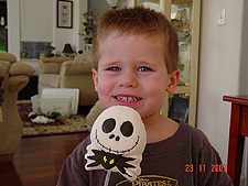 Hunter ready to eat his Jack Skellington marshmellow.