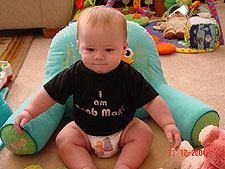 Hunter loves to sit on the floor and play now.