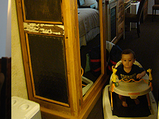 Ryder cruising around in his walker.